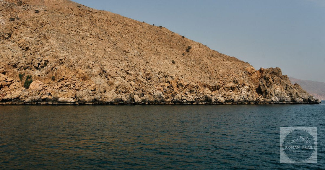 The cliffs and still water of the Musandam peninsula, Oman