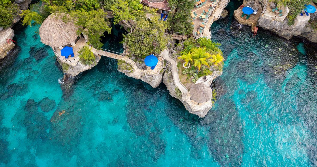 A cliffside resort above turquoise water at Negril, Jamaica