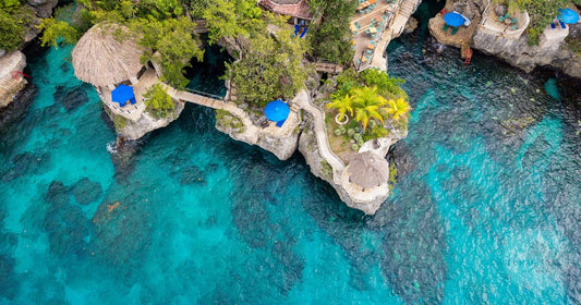 A cliffside resort above turquoise water at Negril, Jamaica