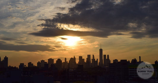 Manhattan skyline at golden hour, New York City packing list for women by Roman Trail Outfitters