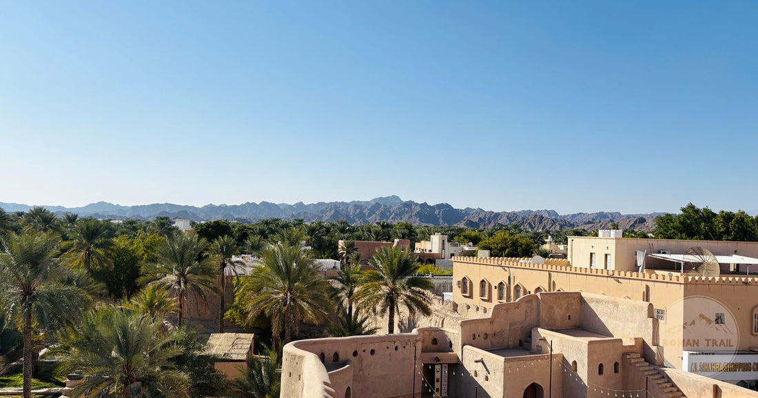 Nizwa Fort and the surrounding oasis below the Hajar Mountains, Oman