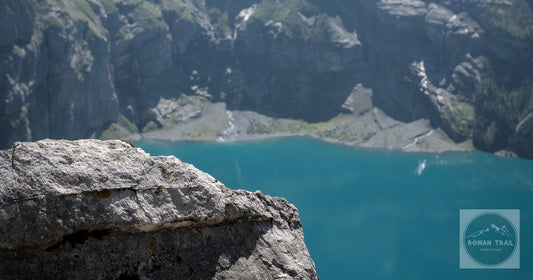 The Oeschinensee below the cliffs of the Swiss Alps at Kandersteg