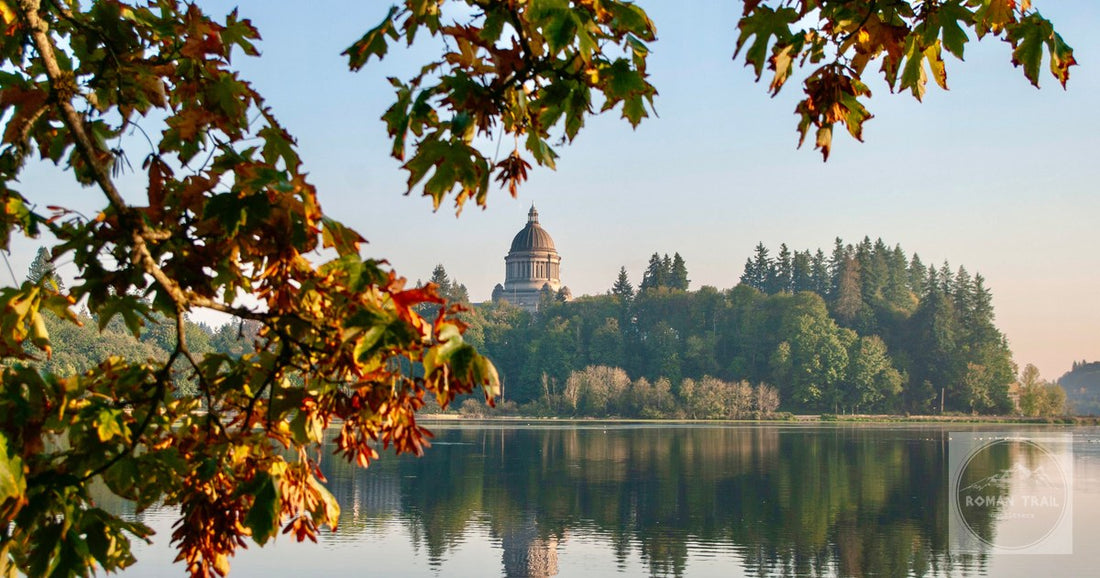 The Washington State Capitol in Olympia reflected in water in autumn