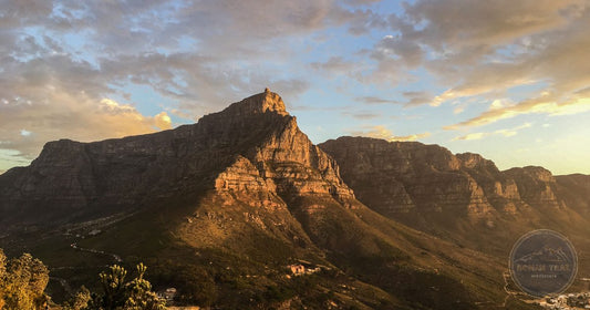 Table Mountain lit by golden hour sunset light, Cape Town South Africa women's packing list destination