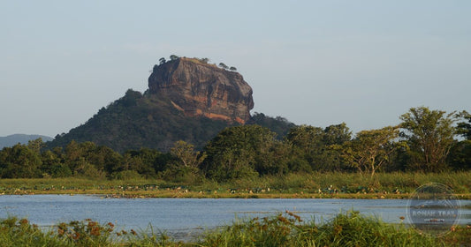 Sigiriya rock fortress reflected in water at dawn, Sri Lanka women's packing list destination