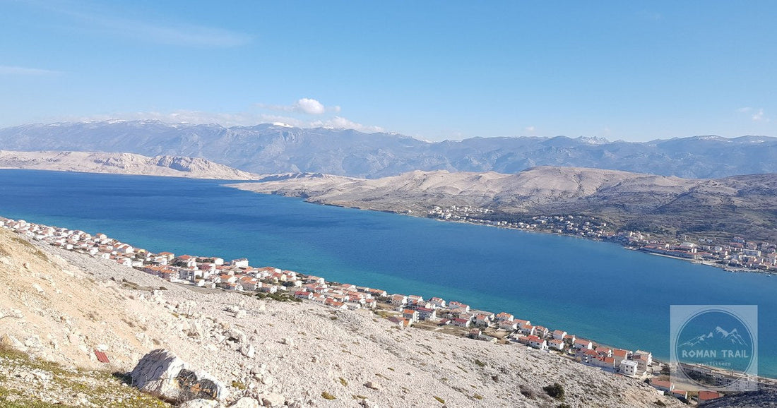 The rugged landscape and clear water of Pag island, Croatia