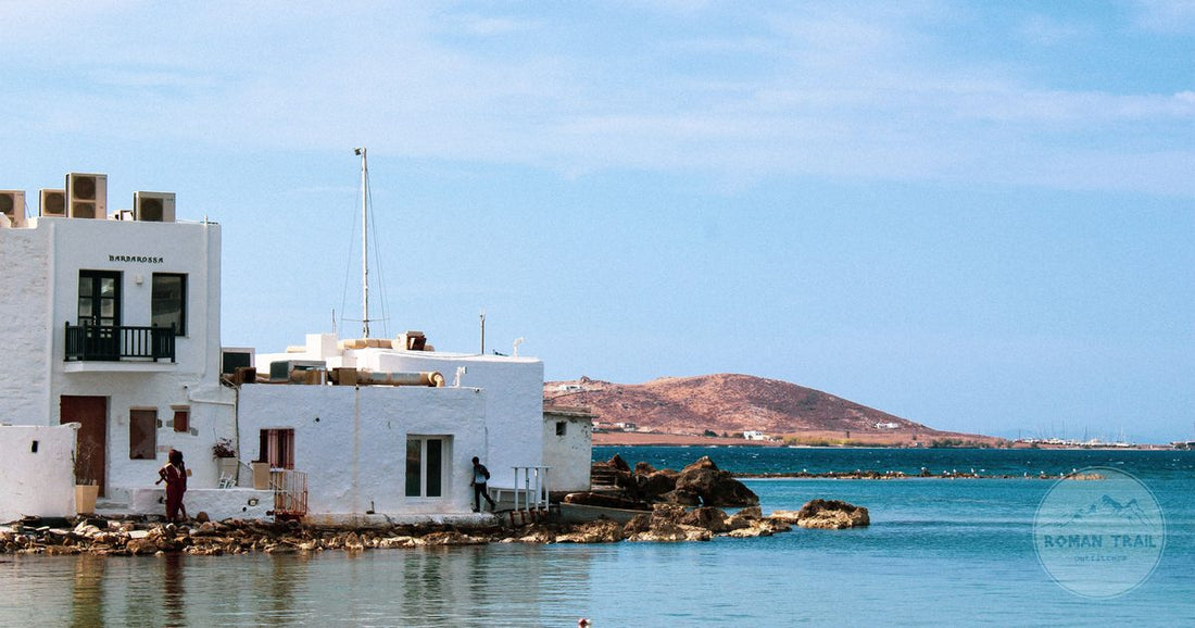 Whitewashed buildings above the water at Naoussa on Paros, Greece