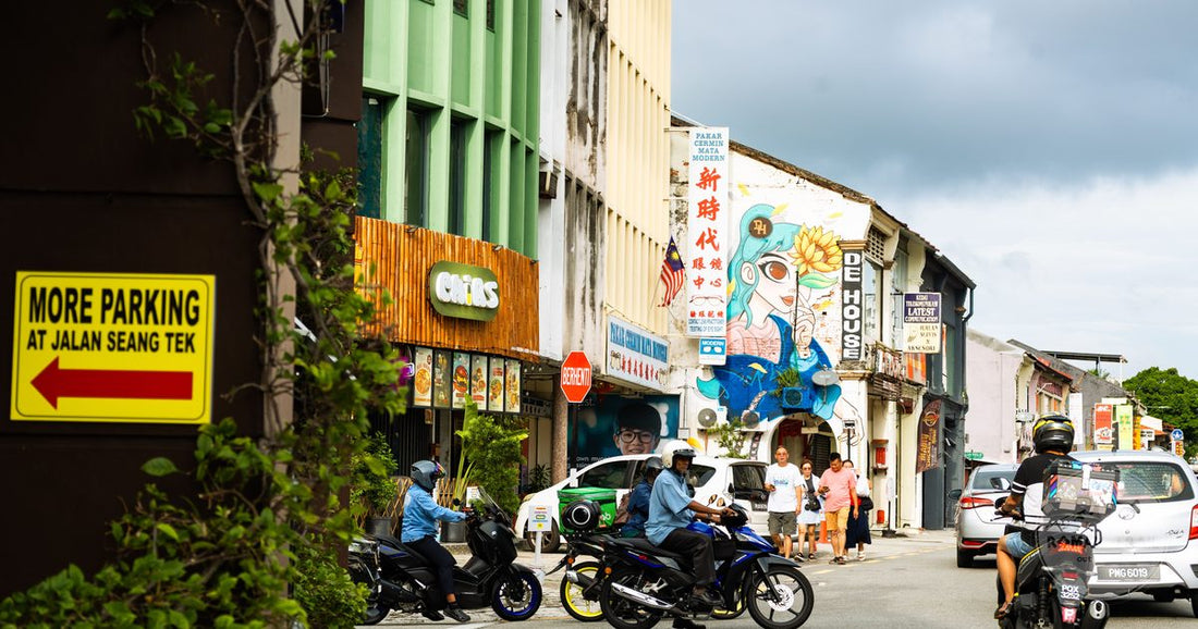A George Town street in Penang lined with pre-war shophouses