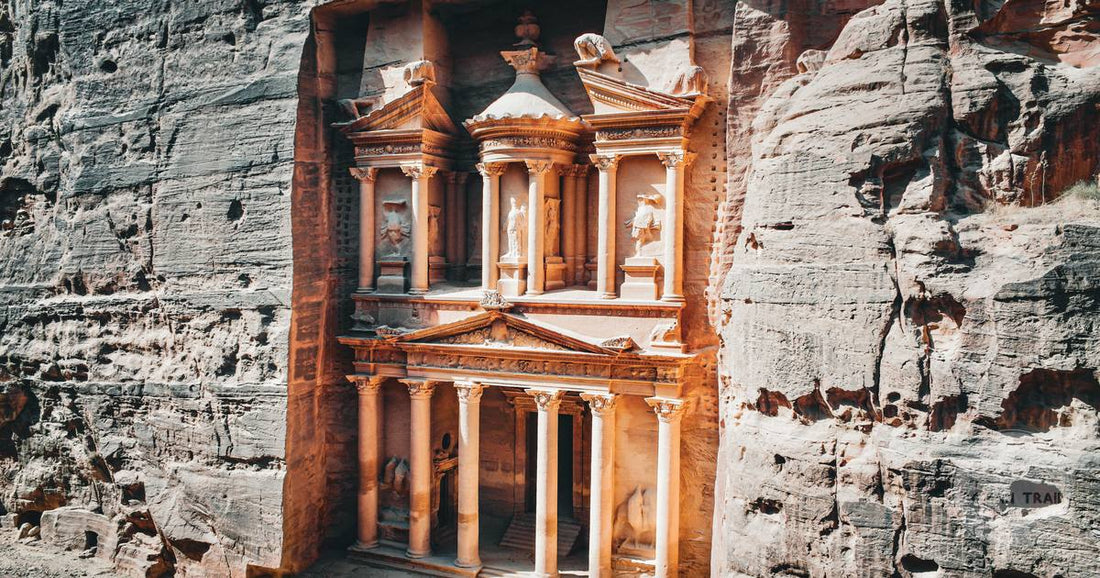 The Treasury at Petra carved into sandstone cliffs, Jordan