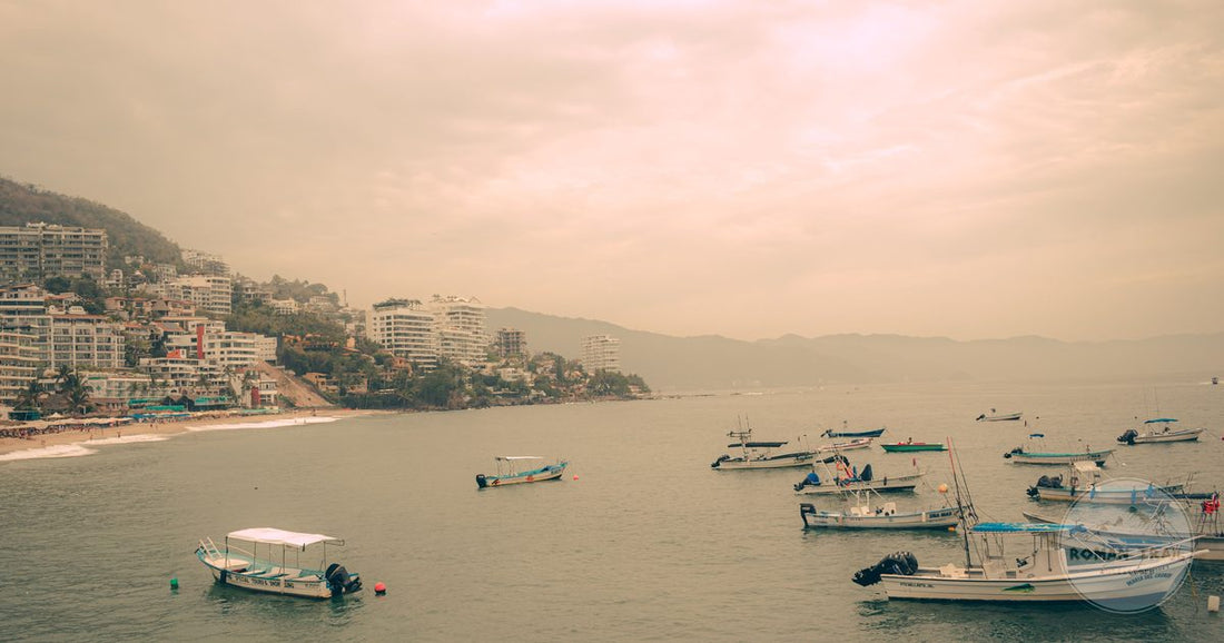 Boats offshore with the coastal buildings of Puerto Vallarta behind, Mexico