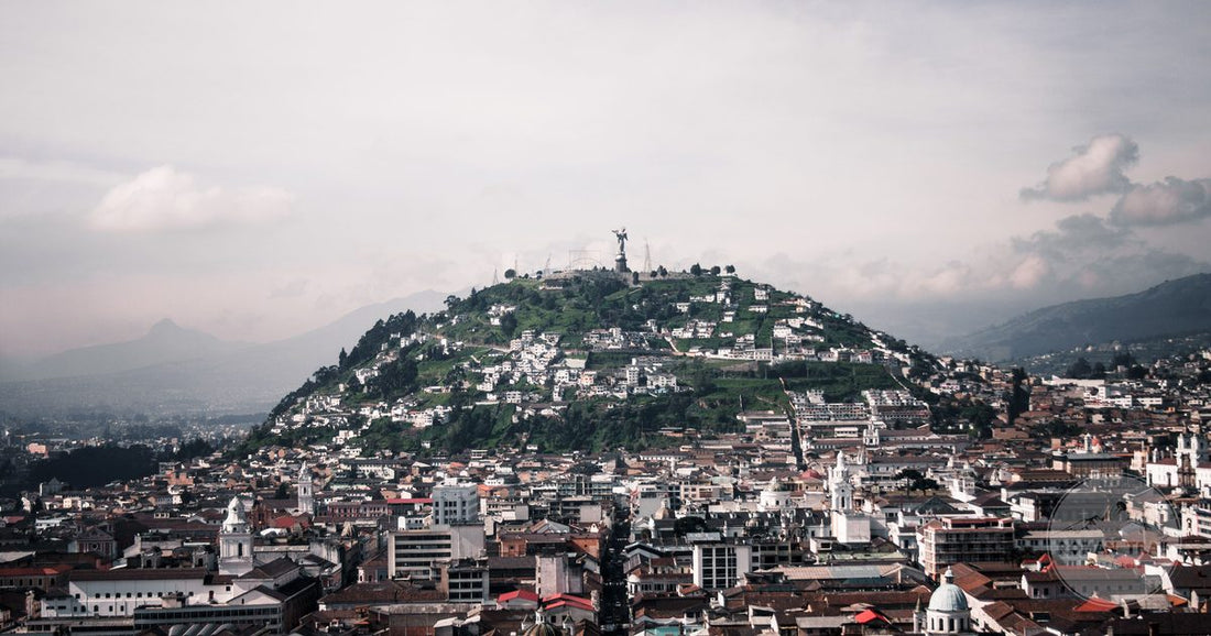 Aerial view of Quito with El Panecillo hill and the Virgin statue above the city, Quito packing list for women by Roman Trail Outfitters