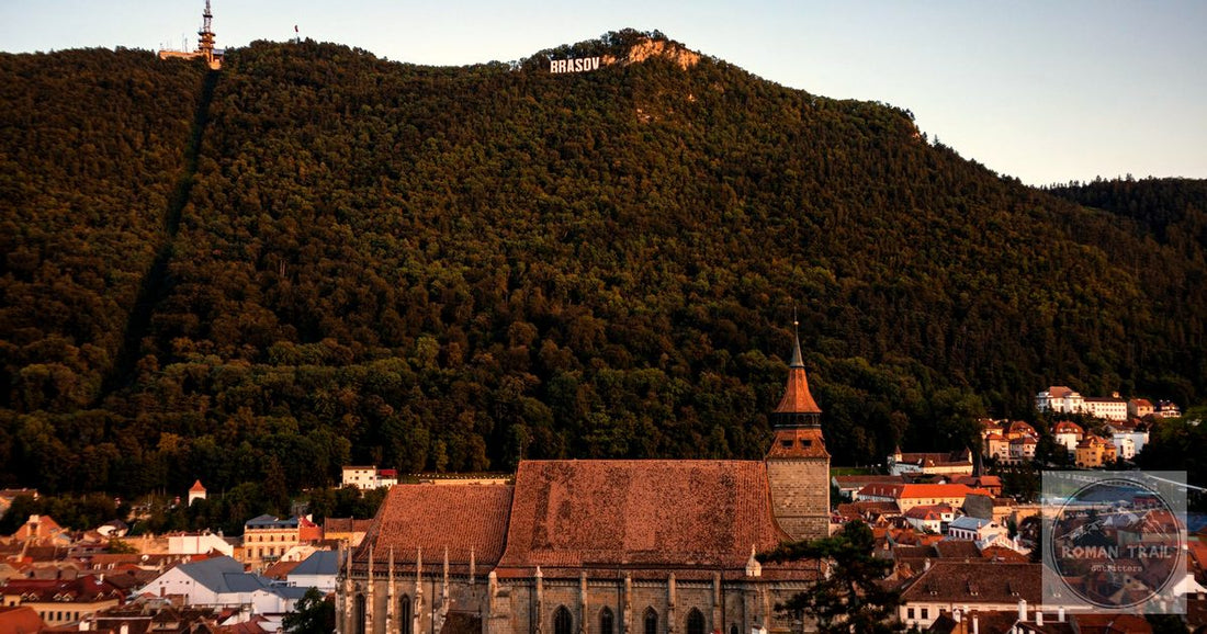 Brasov old town Romania at golden hour with Mount Tampa