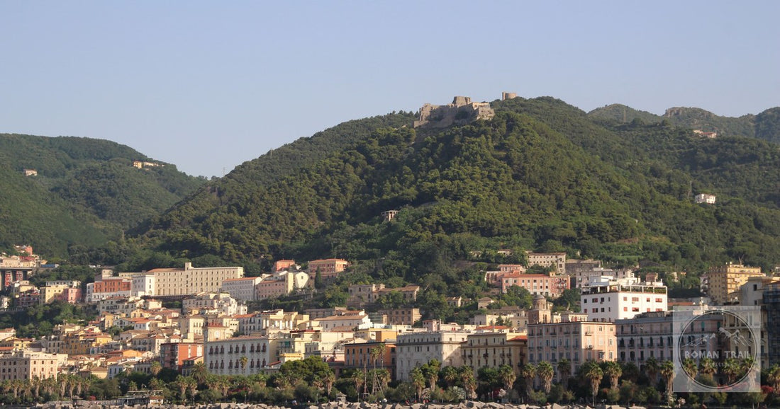 The coastal cityscape of Salerno below green hills, Campania
