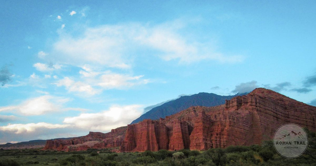 Red rock formations under a clear sky in the Salta region of Argentina, Salta packing list for women by Roman Trail Outfitters