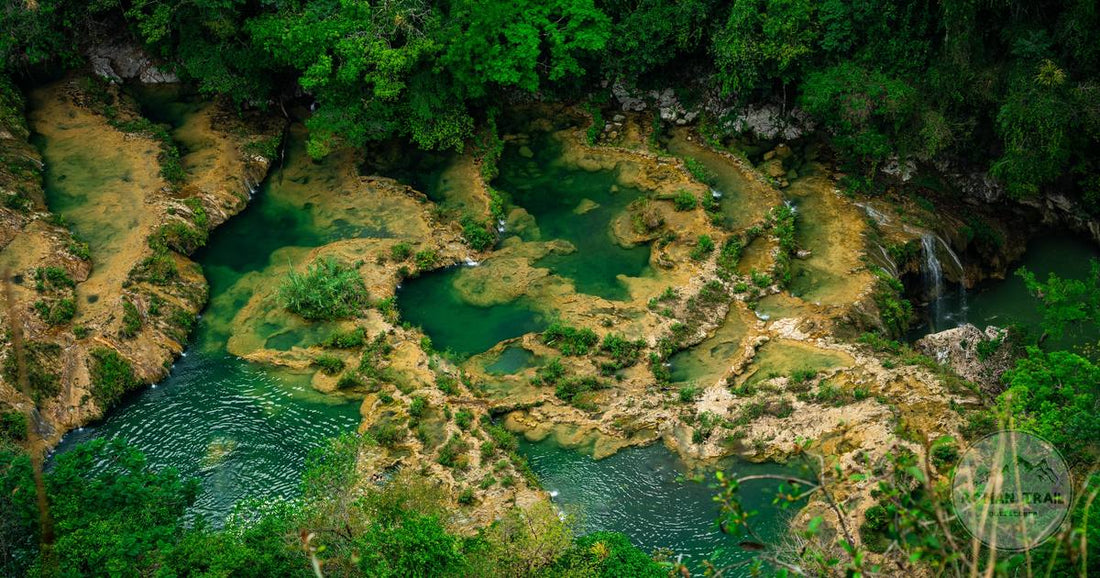 Aerial view of the turquoise pools and forest at Semuc Champey, Guatemala