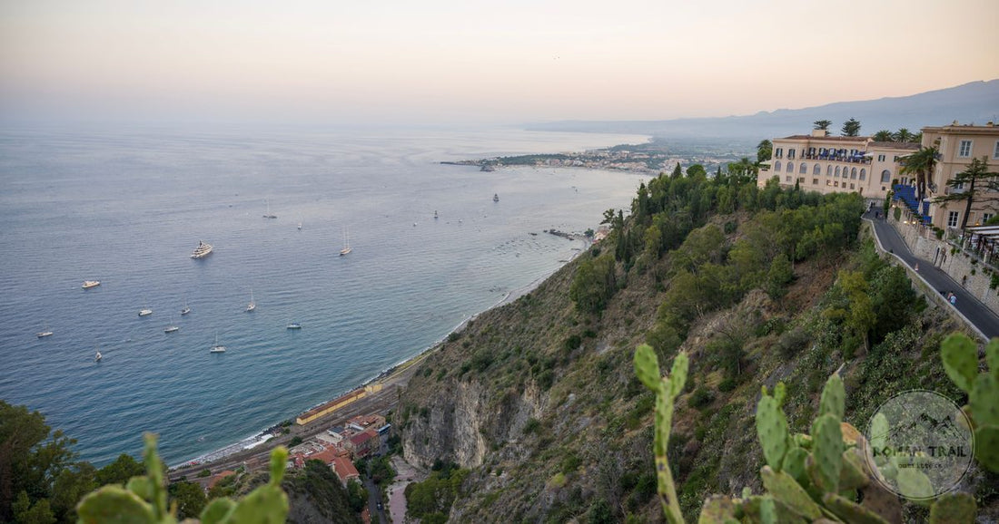 The Sicilian coastline seen from Taormina at sunset, Italy