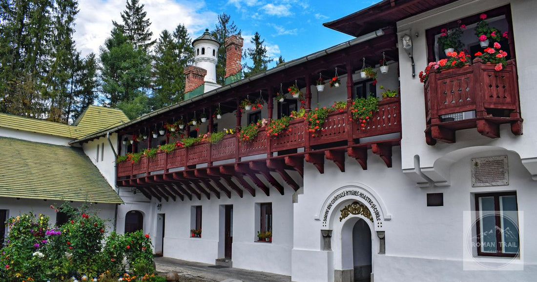 The flower-hung balconies of Sinaia Monastery, Romania