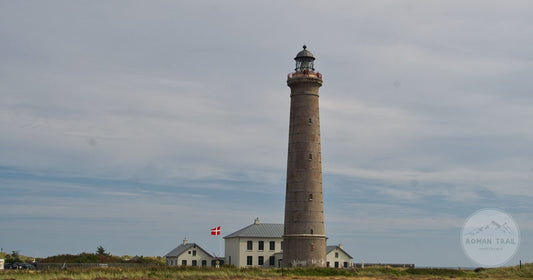 The Skagen lighthouse and its buildings under a bright sky, Denmark