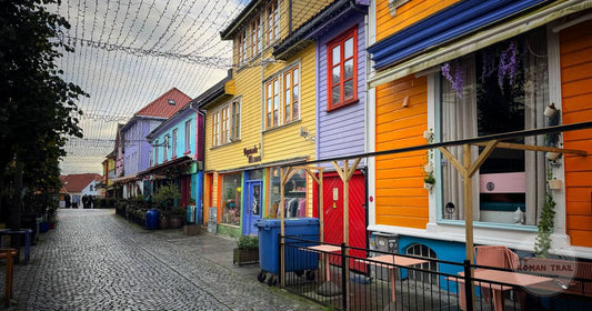 A cobbled lane of white wooden houses in Gamle Stavanger, Norway