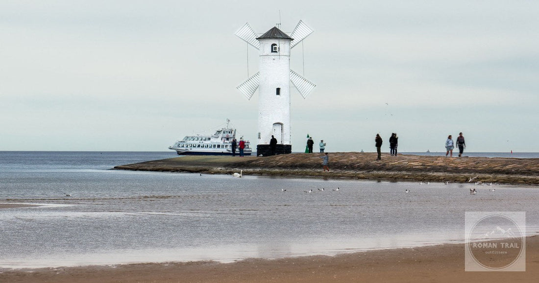 The Stawa Mlyny beacon, shaped like a windmill, on the beach at Swinoujscie, Poland.