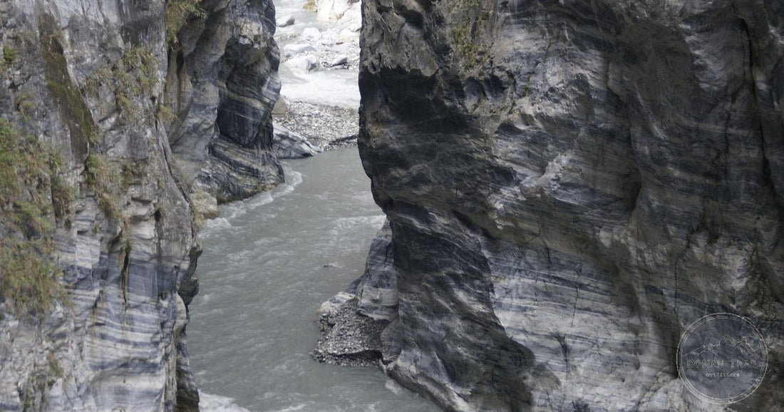 The marble canyon walls of Taroko Gorge rising above the Liwu River, Taiwan