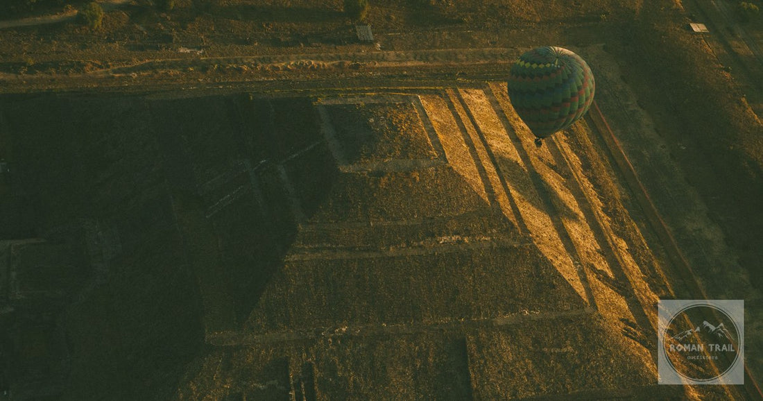 Hot air balloon over Pyramid of the Sun, Teotihuacan at sunrise.