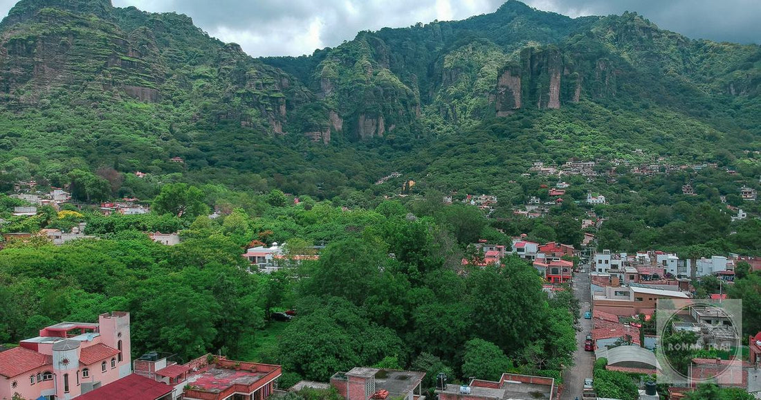 An aerial view of Tepoztlan below its green mountains, Morelos, Mexico
