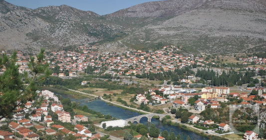 Trebinje, Bosnia and Herzegovina, from the air, the old town, its bridge and the surrounding mountains.
