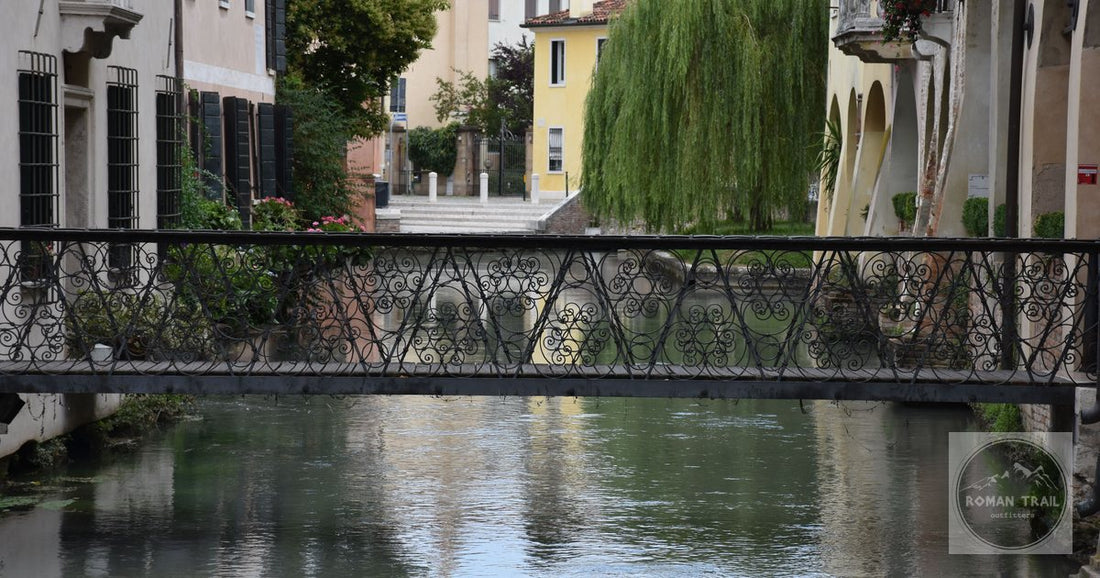 An iron bridge over a canal in Treviso, Italy
