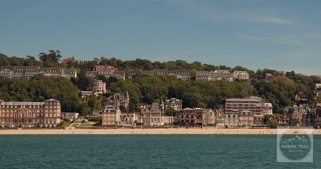 Scenic view of Trouville-sur-Mer beach and charming architecture in Normandy, France under a clear blue sky.