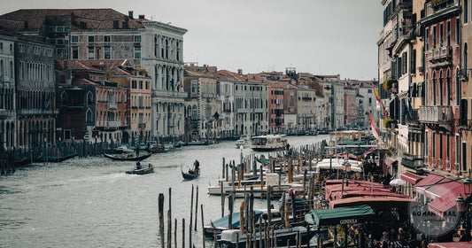 Gondolas on the Grand Canal in Venice at golden hour, Italy