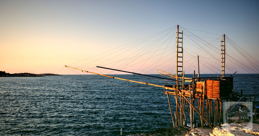 The Trabucco San Lorenzo fishing structure at sunrise near Vieste, Apulia