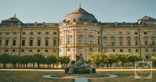 The majestic baroque Würzburg Residence in Bavaria, Germany, under a clear sky.