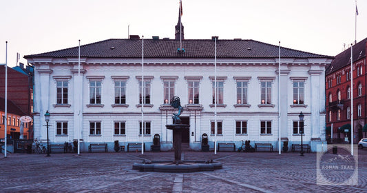 The town hall and fountain at Ystad Sweden at twilight
