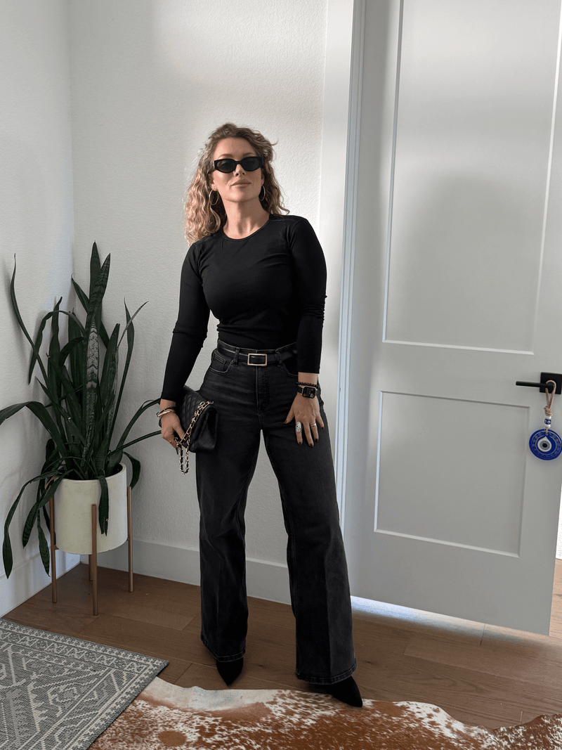 Black merino wool women's base layer by Roman Trail Outfitters