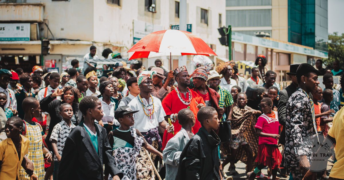 A street procession in traditional dress in Accra, Ghana
