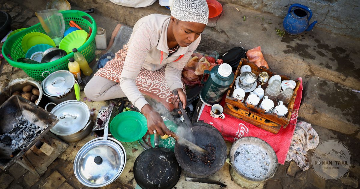 Woman roasting coffee beans in the traditional way in Addis Ababa, Ethiopia