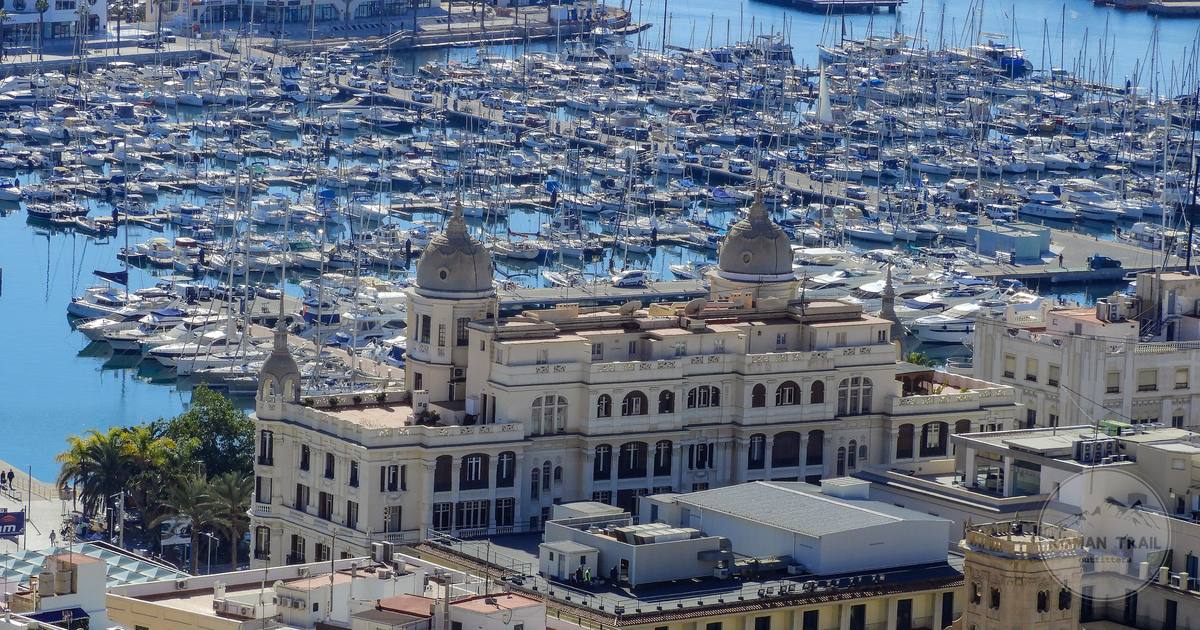 The marina and historic architecture of Alicante under a clear sky, Spain