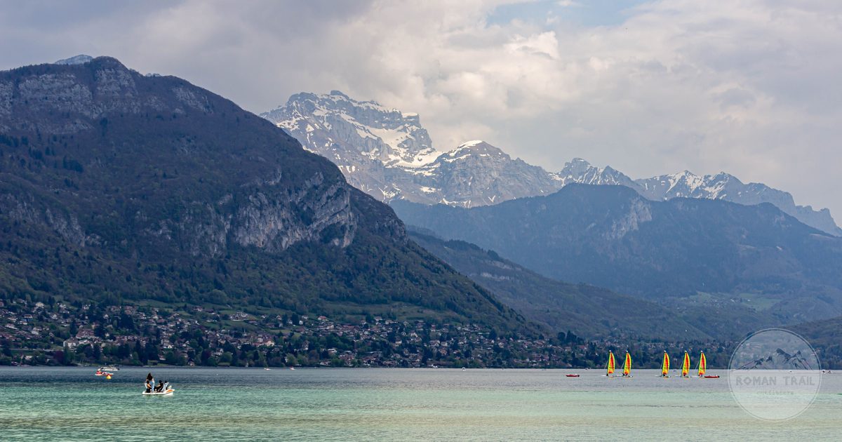 Lake Annecy with snow capped mountains behind, France