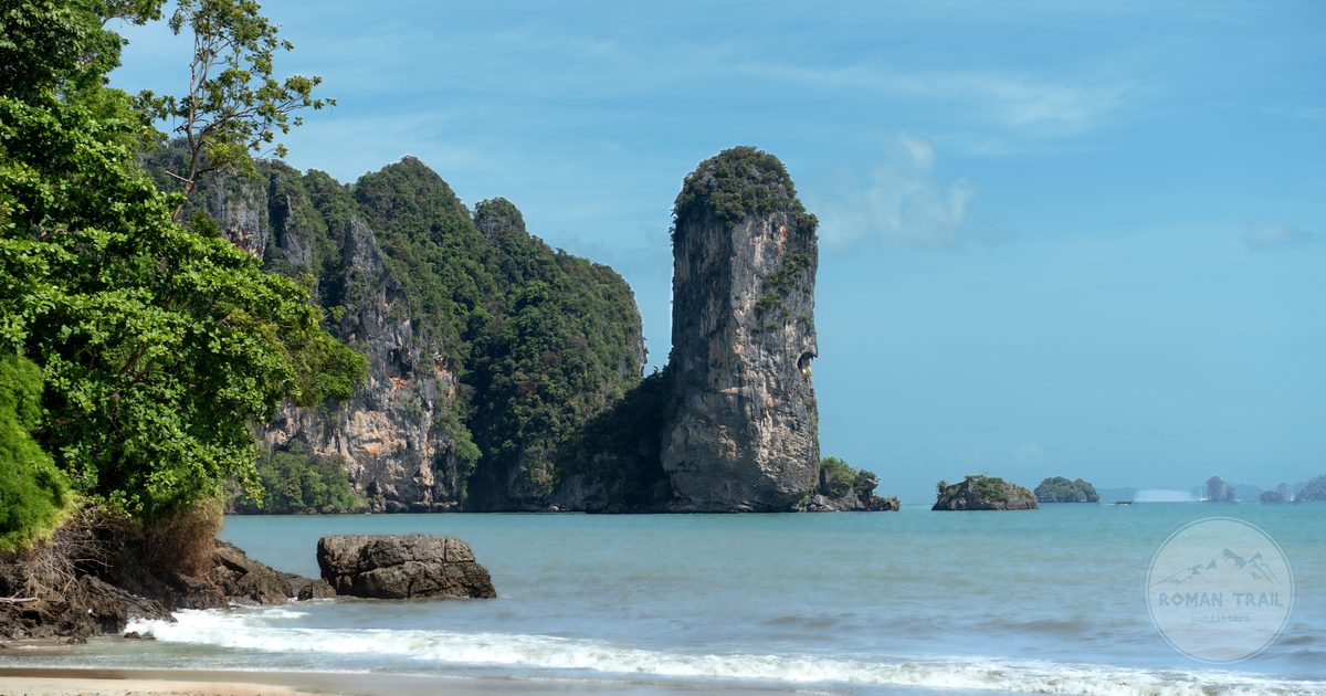 Limestone cliffs above the blue sea at Ao Nang Beach, Krabi, Thailand