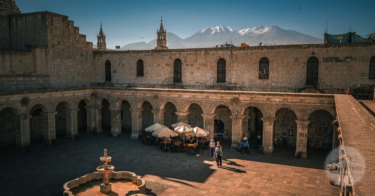 A historic courtyard in Arequipa with the Misti volcano beyond, Peru
