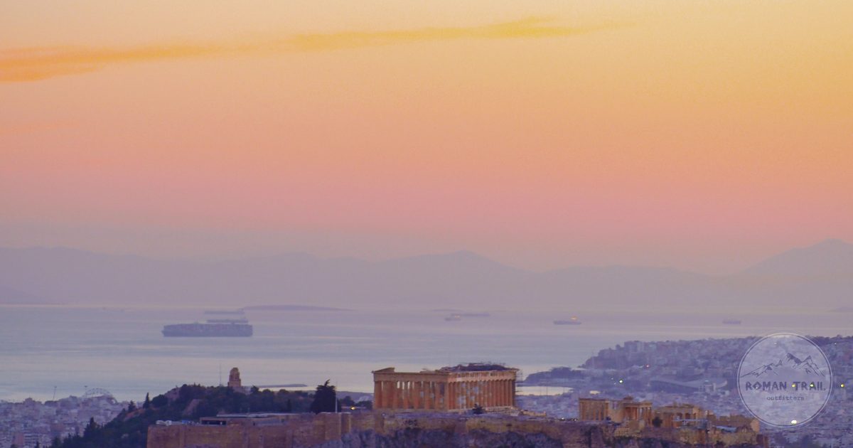 Aerial view of Athens with the Acropolis at sunset, Athens travel guide for women by Roman Trail Outfitters