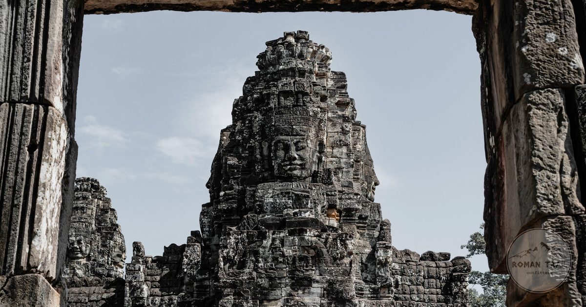 Carved stone face tower at the Bayon temple, Angkor Thom Cambodia