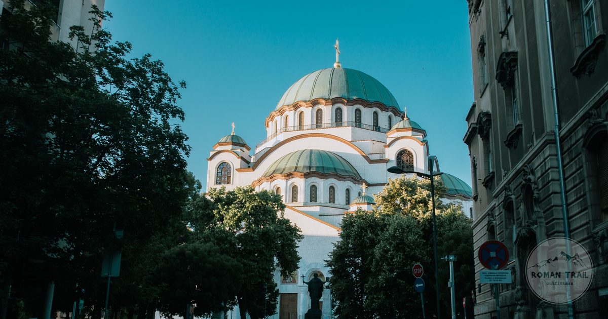 The Saint Sava Temple in Belgrade, Serbia, framed by trees