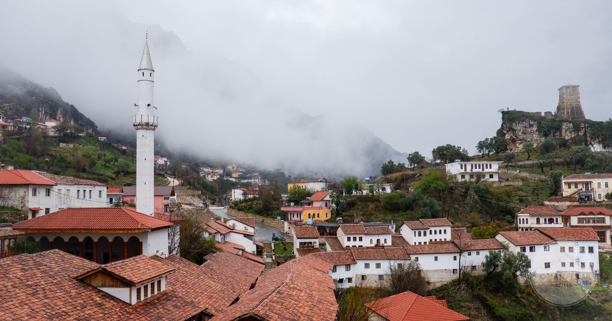 A foggy morning over the Ottoman houses and hilltop castle at Berat, Albania