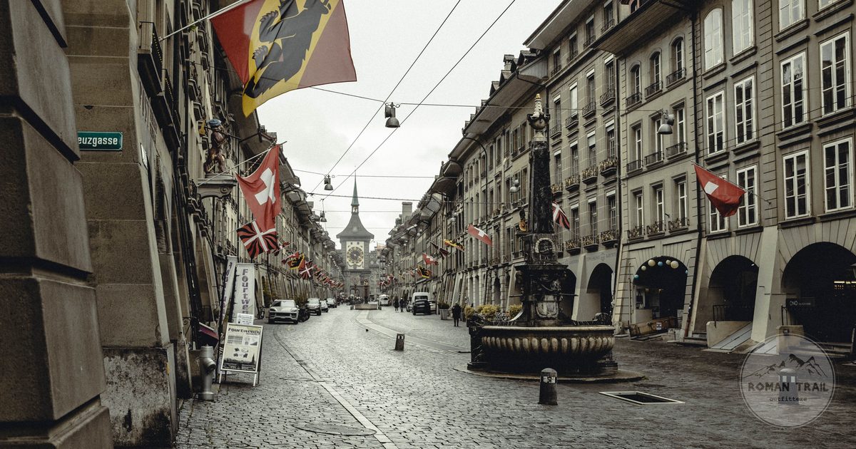 Cobblestone street with arcades in the old town of Bern, Switzerland