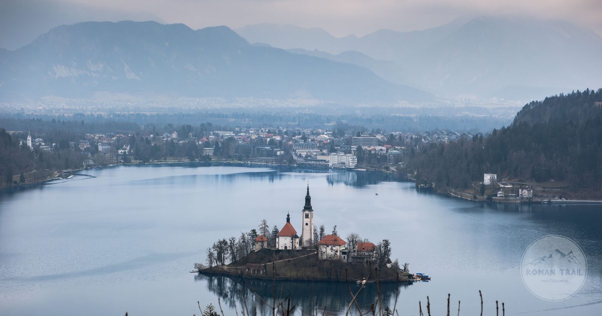 Aerial view of Lake Bled and its island church in winter, Slovenia
