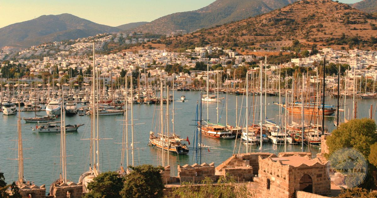 Yachts in Bodrum harbour against the hills and town, Turkiye