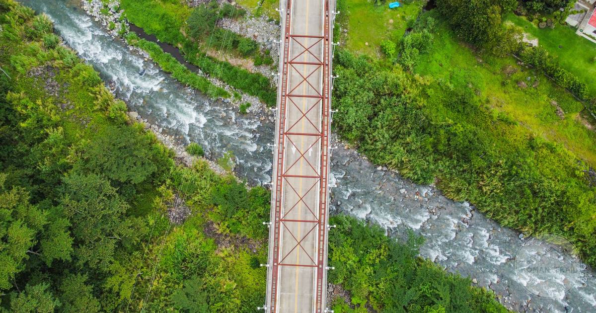 A bridge over a green river valley at Bajo Boquete, Panama
