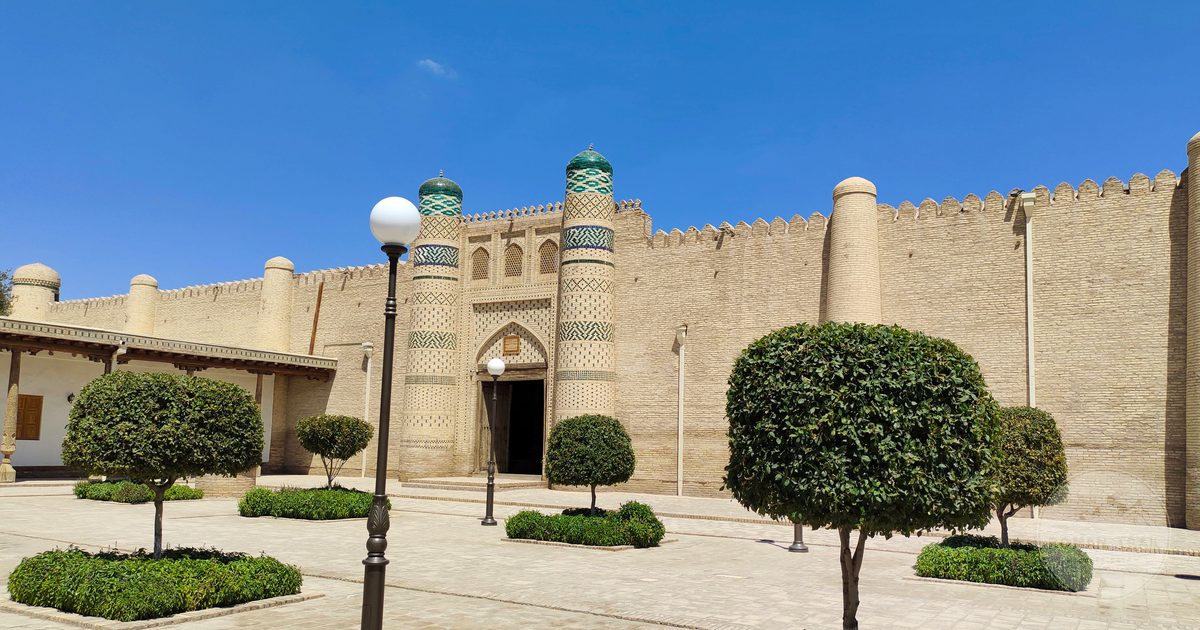 A historic fortress wall in Bukhara, Uzbekistan, in bright daylight